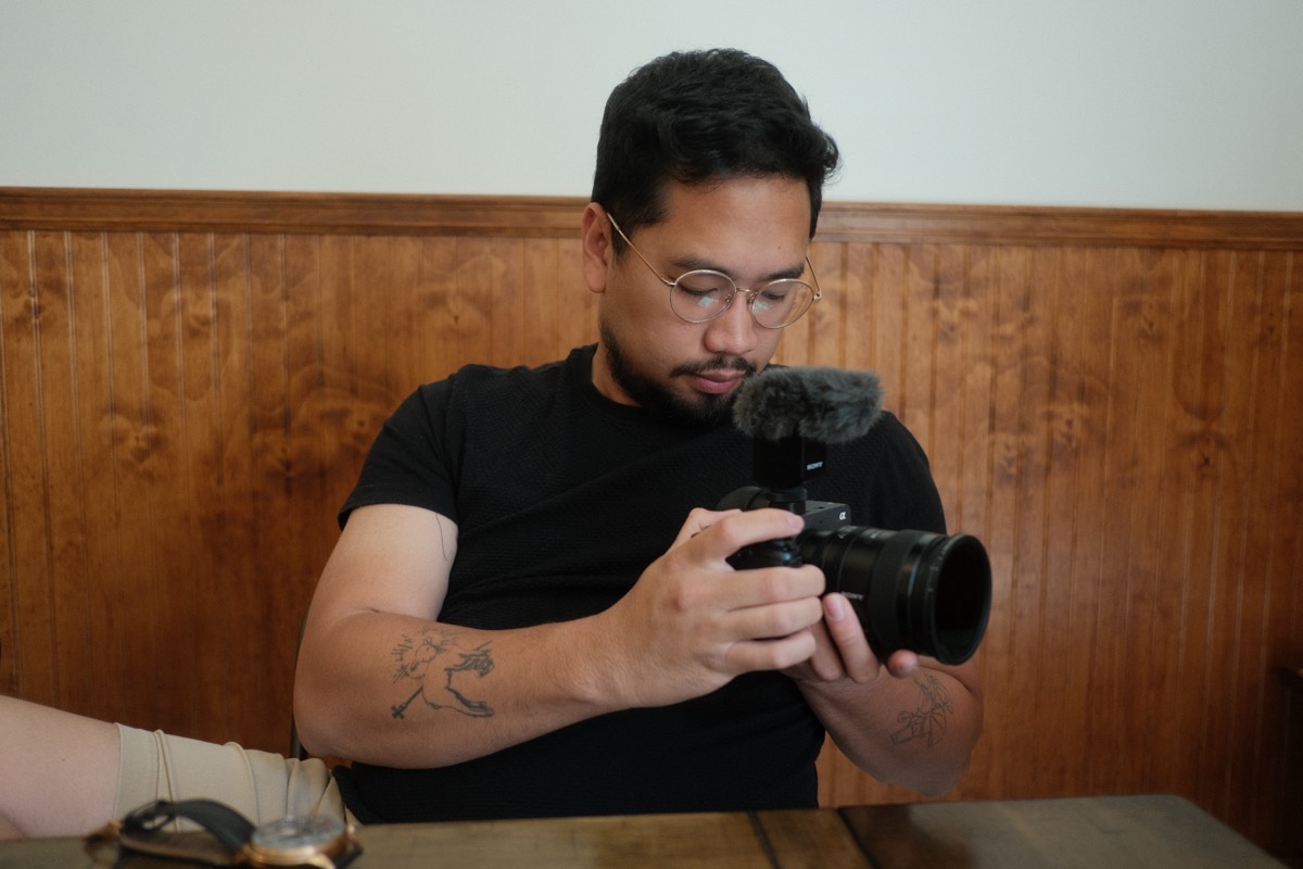 Josh Garcia holding a camera